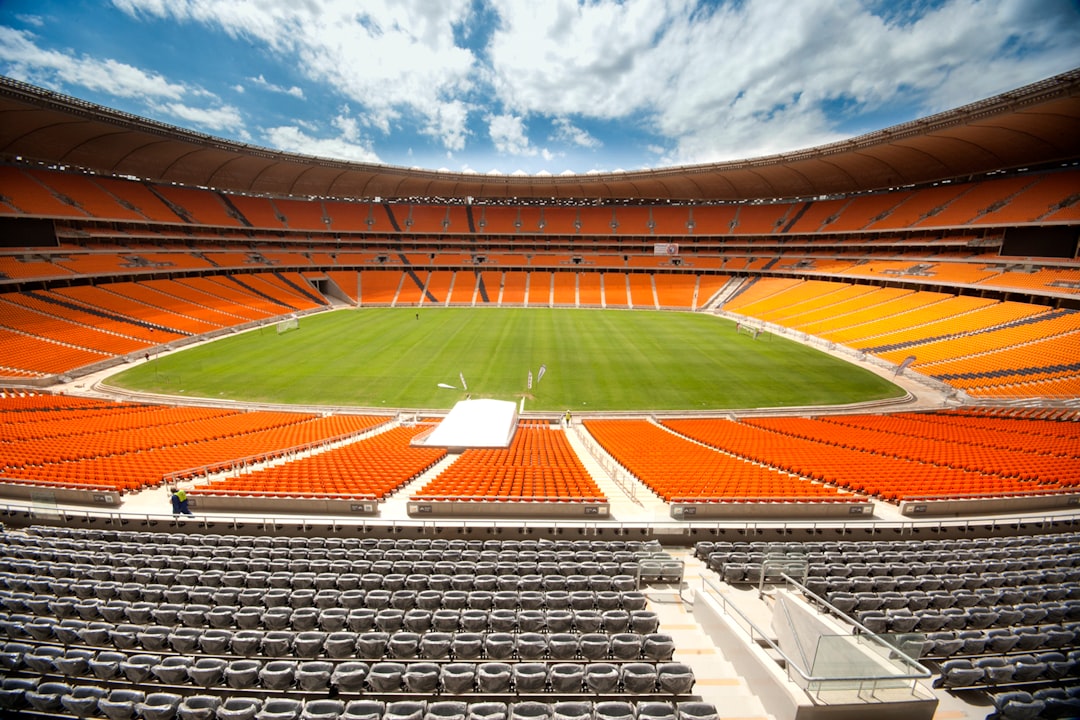 What Happens to Your Bet When a Football Match Is Abandoned in Kenya? Empty football stadium representing an abandoned match